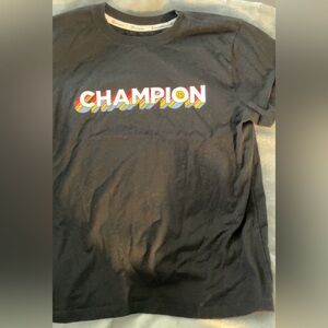 Medium black smiley champion shirt. Lightly worn.